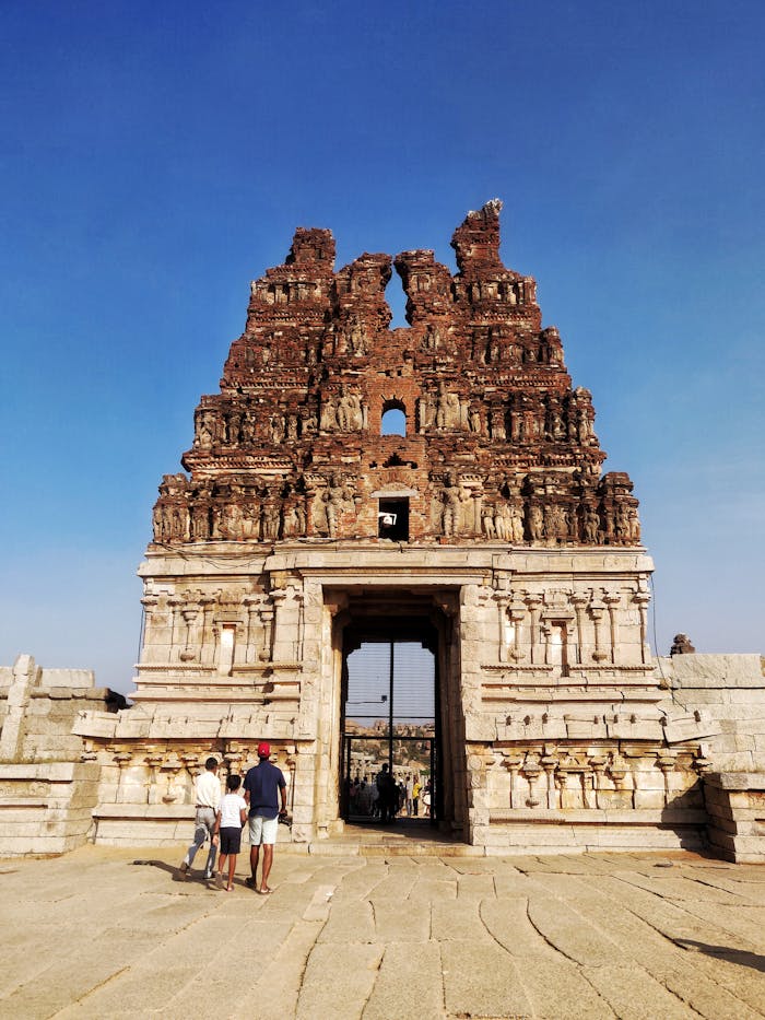 Guided-photo-125381020 Explore the ancient architecture of Vittala Temple in Hampi, a historical landmark in India.