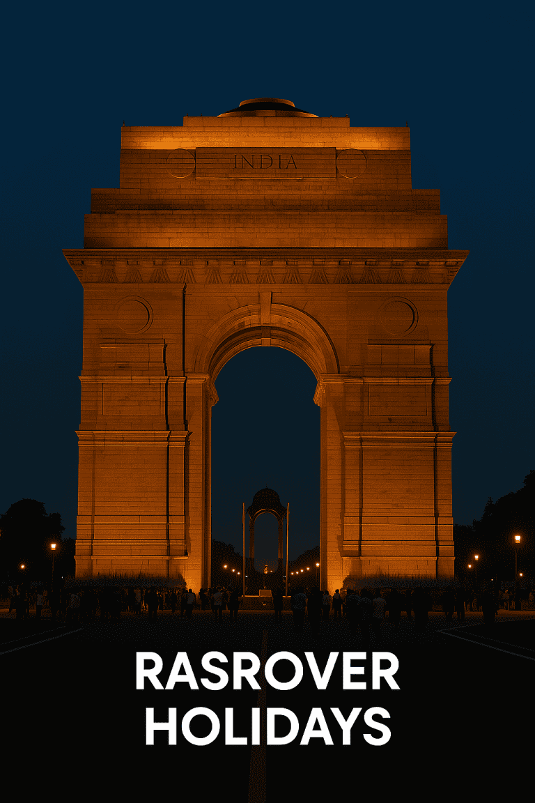 India Gate lit up at night in New Delhi with “Rasrover Holidays” text overlay